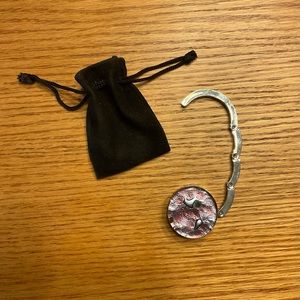 Jewel-topped purse hanger